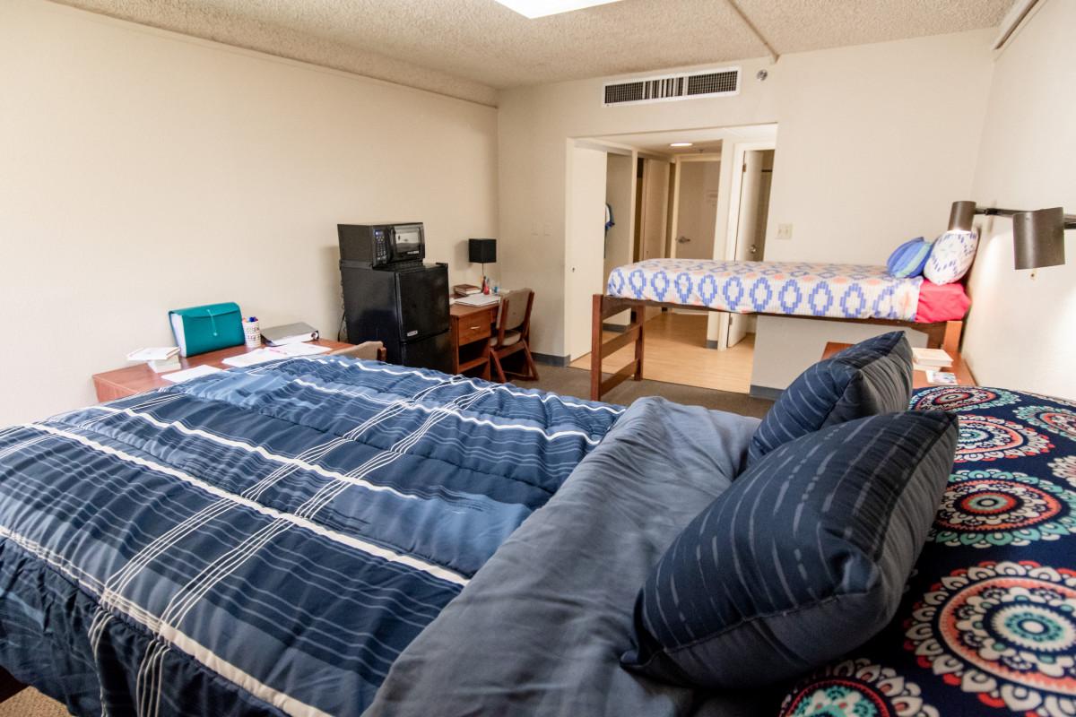 Beds in dorm room in Massie Hall