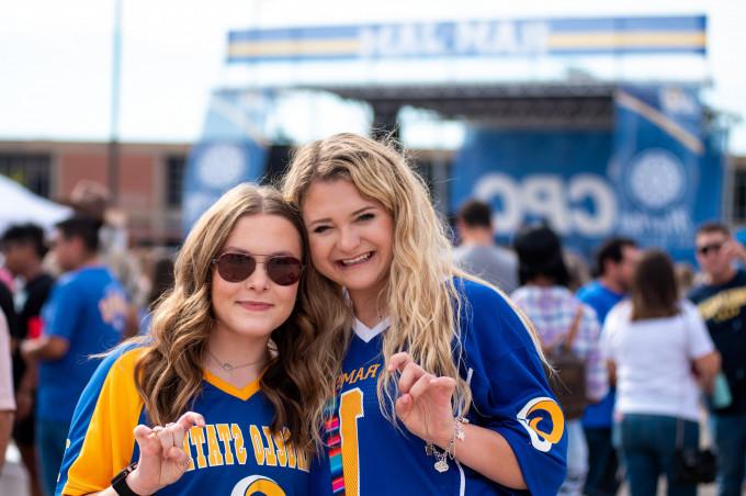 Two female students at the Angelo States Homecoming tailgate - Ram Jam